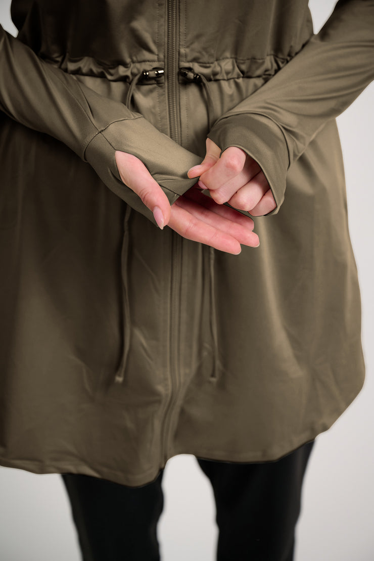 Loose fitting workout jacket with thumb holes